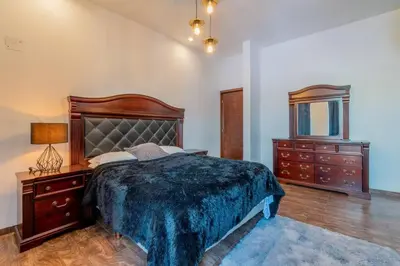 Cama o camas de una habitación en Elegante Condo CentroHistórico con Cochera