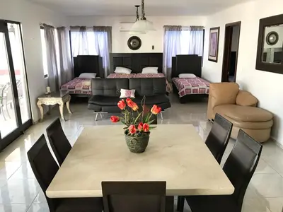 Cama o camas de una habitación en Amplios exteriores y alberca