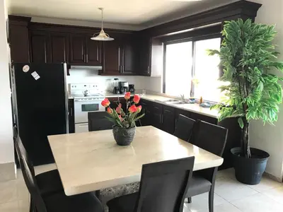 Una cocina o zona de cocina en Amplios exteriores y alberca