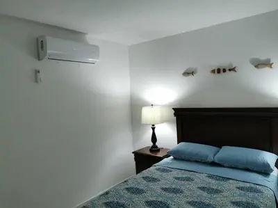 Cama o camas de una habitación en Excelente apto muy cerca de la playa 202