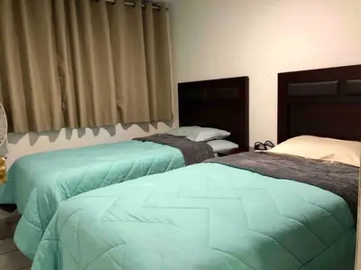 Cama o camas de una habitación en 302 Excelente apto muy Cerca de Playa