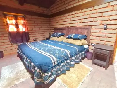 Cama o camas de una habitación en Cabaña El Fresno