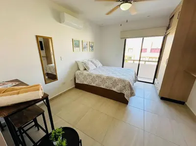 Cama o camas de una habitación en Ámbar 411 muy cerca del mar