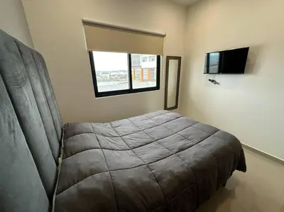 Una televisión o centro de entretenimiento en Ferrara Mazatlan cerca Del Mar