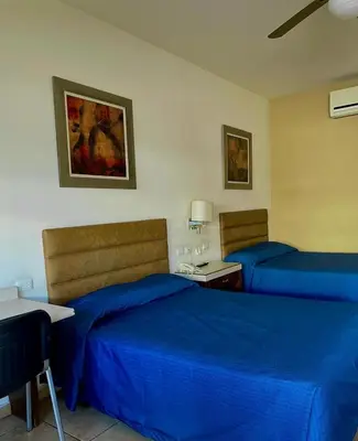 Zona de estar de Hotel las Palmas