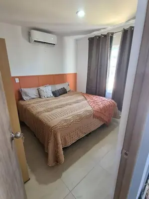Cama o camas de una habitación en Departamento Vacacional en Mazatlán