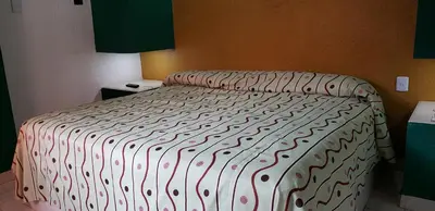 Cama o camas de una habitación en Hotel Viena