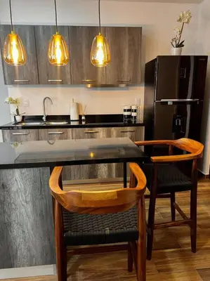 Una cocina o zona de cocina en Ubicado en la marina/cerca de la playa/ 2 albercas