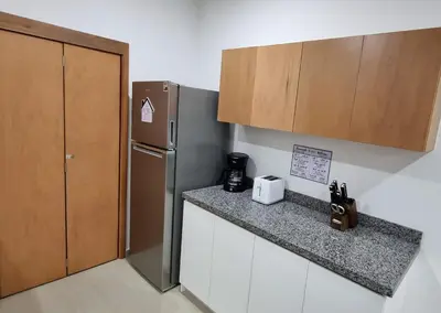 Una cocina o zona de cocina en Confortable Departamento
