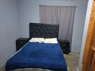 Cama o camas de una habitación en Mi casa