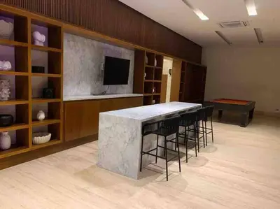 Una televisión o centro de entretenimiento en Casita del Mar Condo