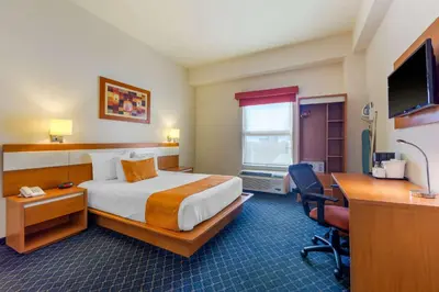 Cama o camas de una habitación en Greenwood Hotel Torreón
