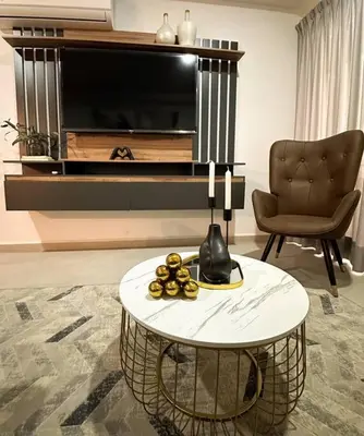 Una televisión o centro de entretenimiento en Bluu Lagoon 508-Depa de lujo con playa privada