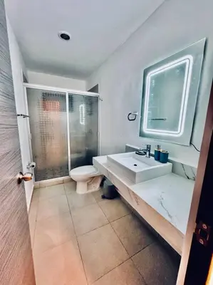 Un baño de E&S Estancia vacacional