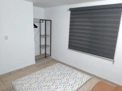 Cama o camas de una habitación en Depa Eco en planta baja, a 5 minutos del malecon y zona dorada