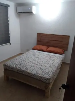 Cama o camas de una habitación en Depa Eco en planta baja, a 5 minutos del malecon y zona dorada