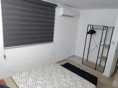 Cama o camas de una habitación en Depa Eco en planta baja, a 5 minutos del malecon y zona dorada