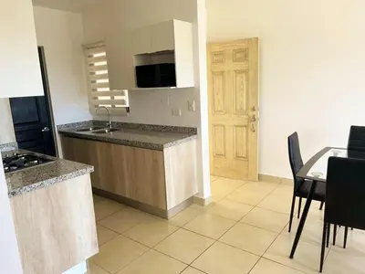 Una cocina o zona de cocina en Depto Privado de Lujo Azul Turquesa - 2 Recamaras