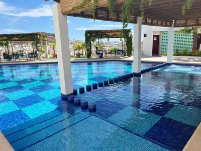 Piscina en o cerca de Depto Privado de Lujo Azul Turquesa - 2 Recamaras