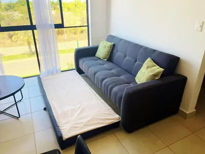 Zona de estar de Depto Privado de Lujo Azul Turquesa - 2 Recamaras