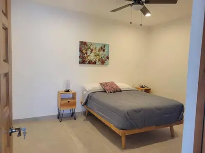 Cama o camas de una habitación en confortable, amplio departamento
