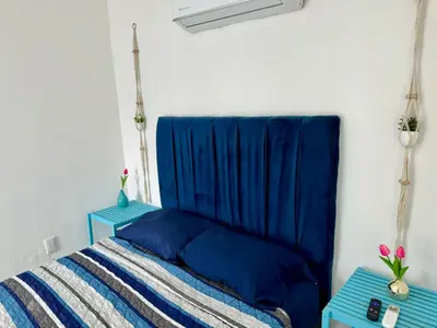 Cama o camas de una habitación en Isla Venados Habitaciones Vacacionales