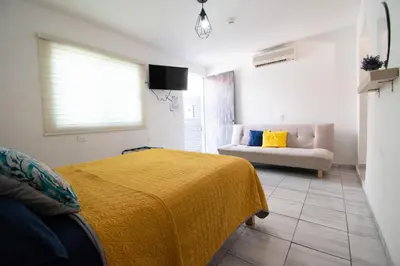 Cama o camas de una habitación en Isla Venados Habitaciones Vacacionales