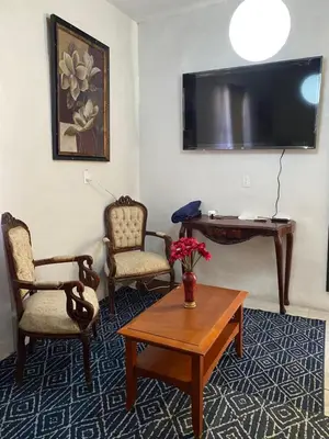 Una televisión o centro de entretenimiento en Renta de habitación/cama matrimonial