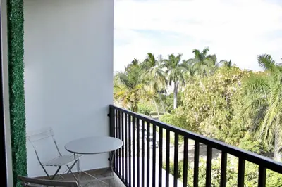 Un balcón o terraza de Hotel boutique cerca de Zona Dorada by G p s rentas