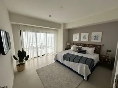 Cama o camas de una habitación en Vistas increíbles frente al mar,10° piso en el malecón de Mazatlán