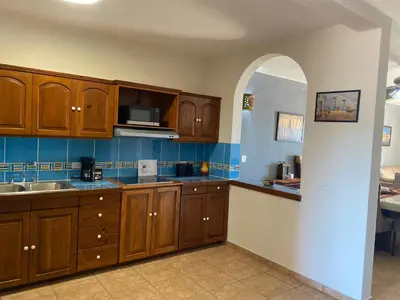 Una cocina o zona de cocina en Loreto Palms Suites