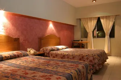 Cama o camas de una habitación en Tarahumara Inn