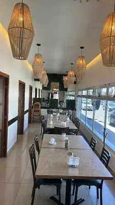 Un restaurante o sitio para comer en Tarahumara Inn