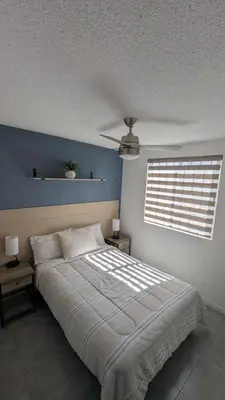 Cama o camas de una habitación en Acogedora Casa