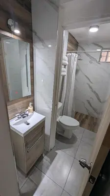 Un baño de Acogedora Casa