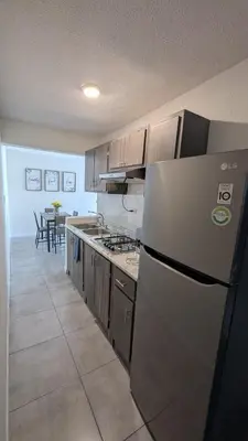 Una cocina o zona de cocina en Acogedora Casa