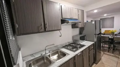 Una cocina o zona de cocina en Acogedora Casa
