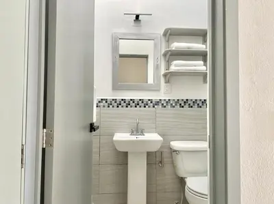 Un baño de Ecosuite 2, Near the beach and shared terrace.