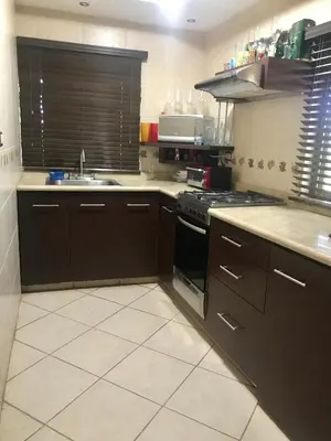 Una cocina o zona de cocina en Departamento de descanso en rancho.