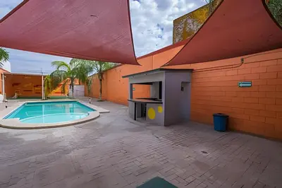 Piscina en o cerca de Hermosa Casa con Alberca 1 Habitación