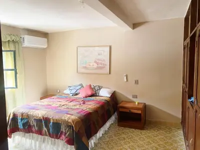 Cama o camas de una habitación en Casa Estancia Viajera Olímpica - 7 Min Malecón