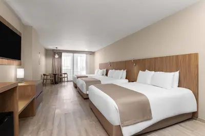 Cama o camas de una habitación en Wyndham Garden Mazatlan Marina