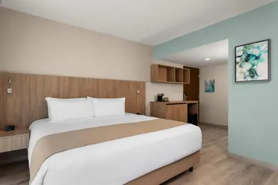 Cama o camas de una habitación en Wyndham Garden Mazatlan Marina