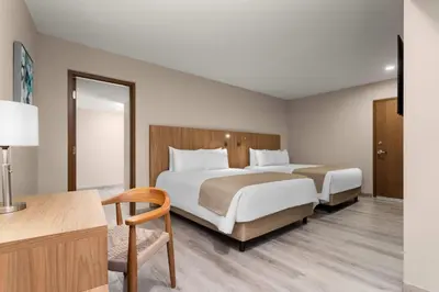 Cama o camas de una habitación en Wyndham Garden Mazatlan Marina