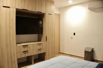 Cama o camas de una habitación en Brujas Tower- Hermoso departamento a pie de playa.