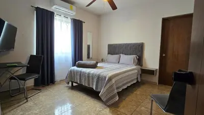 Cama o camas de una habitación en Habitacion Cedro