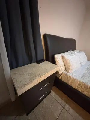 Cama o camas de una habitación en Habitación Roble, cómoda y espaciosa