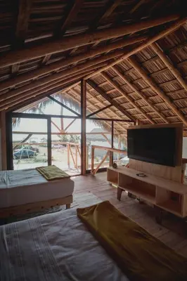 Cama o camas de una habitación en Toninas México Bungalow