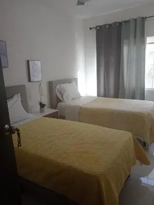 Cama o camas de una habitación en Casa Huesped San Marcos