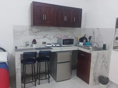 Una cocina o zona de cocina en DEPARTAMENTO PERLITA